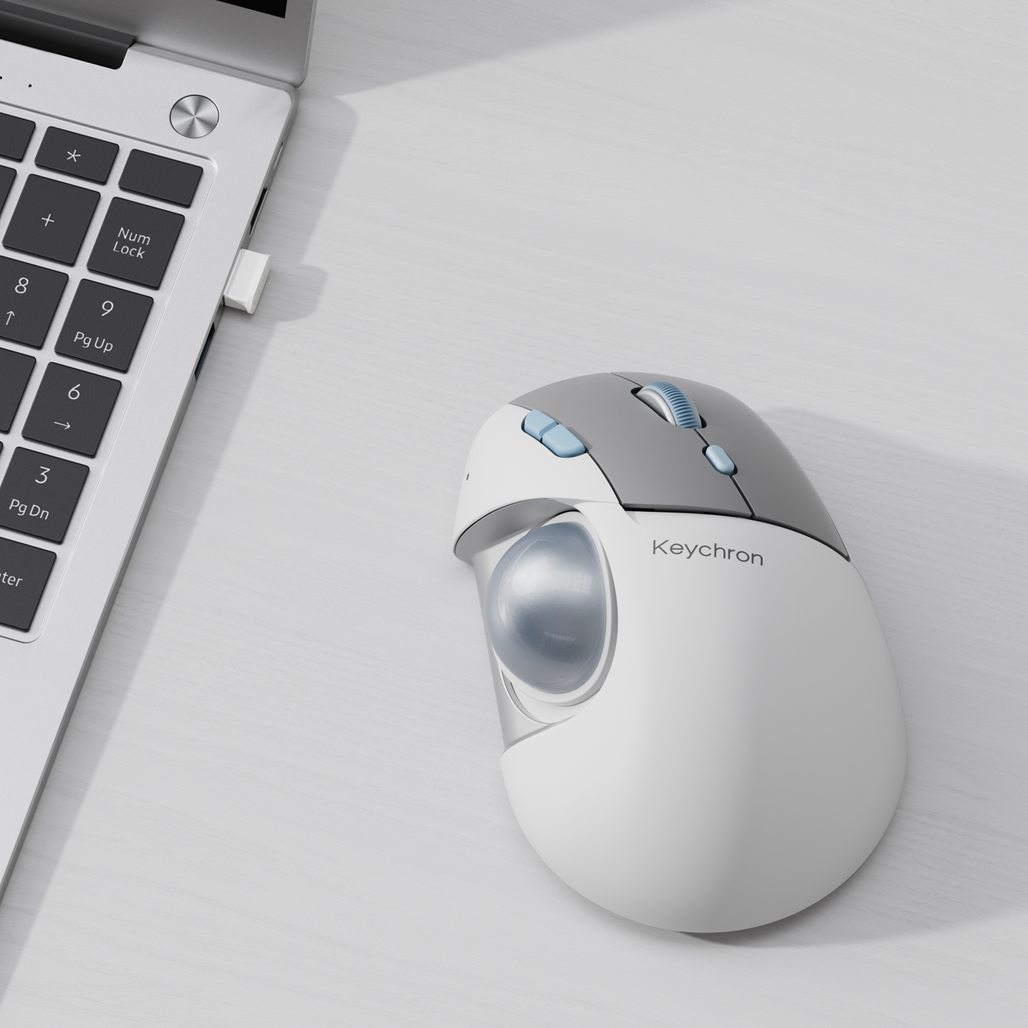 Keychron 首款轨迹球鼠标 T1 HE、轨迹球分体键盘 Orca echo 亮相引发关注